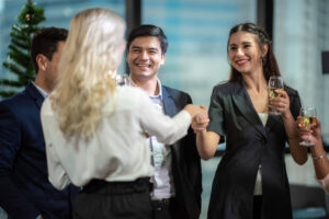 A group of working people are hanging out celebrating New Year's holidays and Christmas. A group of working people are hanging out celebrating New Year's holidays and Christmas.